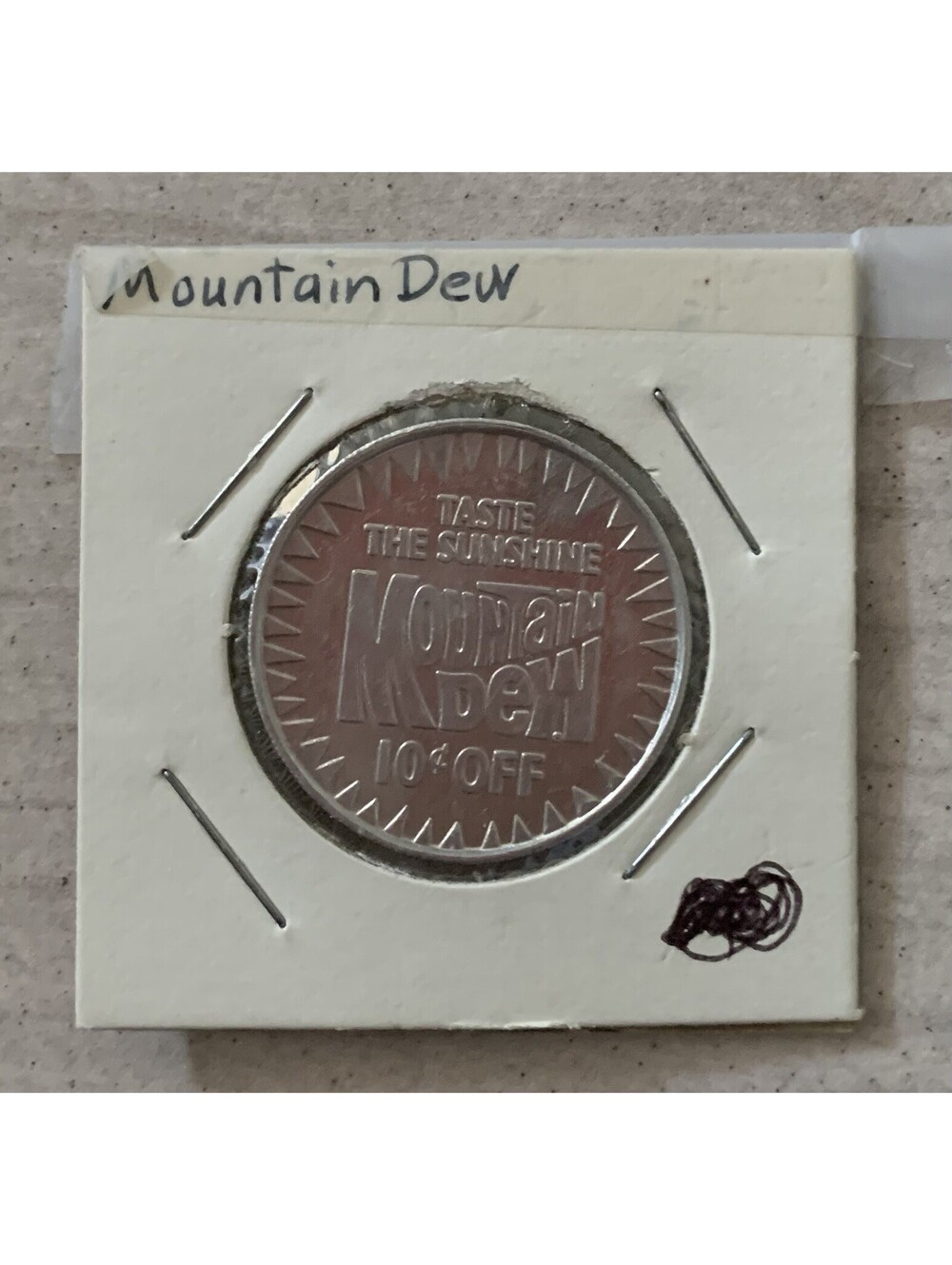 1980 Mountain Dew Token “Taste The Sunshine” Promo 10¢ Off Soda Coin Vintage